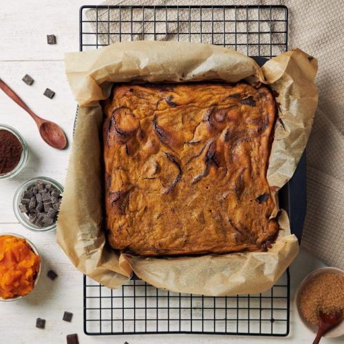 top-view-freshly-baked-delicious-pumpkin-swirl-brownies-baking-tray
